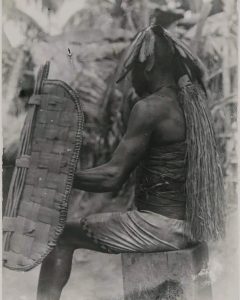 An Igbo elder of Awka wearing a war helmet Photographed by Northcote Thomas, c. 1913. Credit: Isioma Ani