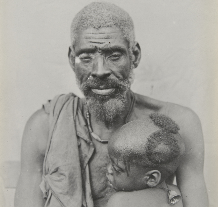 A man and child from Igbariam, c. 1911